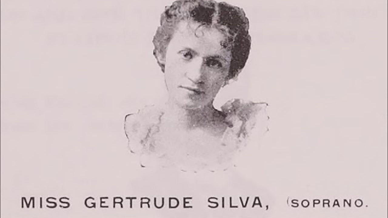an old black and white headshot of a woman