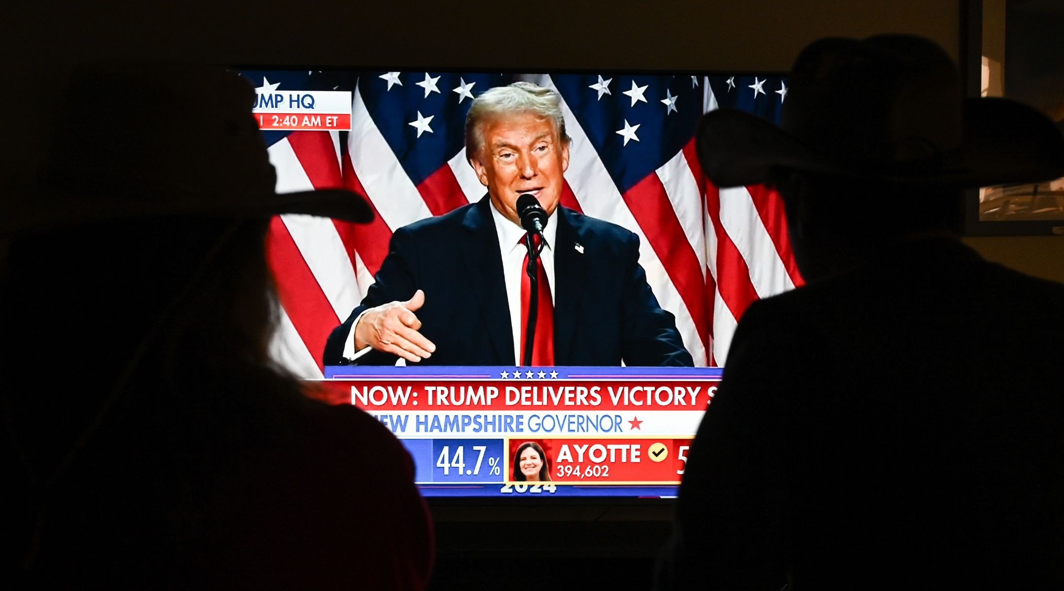 A couple watches President Donald Trump's victory speech from a TV screen, Nov. 5, 2024, in Foster City, Calif. (Tayfun Coskun/Anadolu via Getty Images)