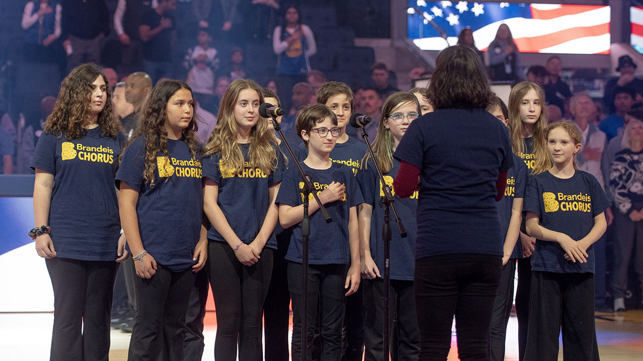 The Brandeis School of San Francisco Chorus performs the national anthem during the Golden State Warriors’ Jewish Heritage Night at the Chase Center in San Francisco, Dec. 5, 2024. (Aaron Levy-Wolins/J. Staff)