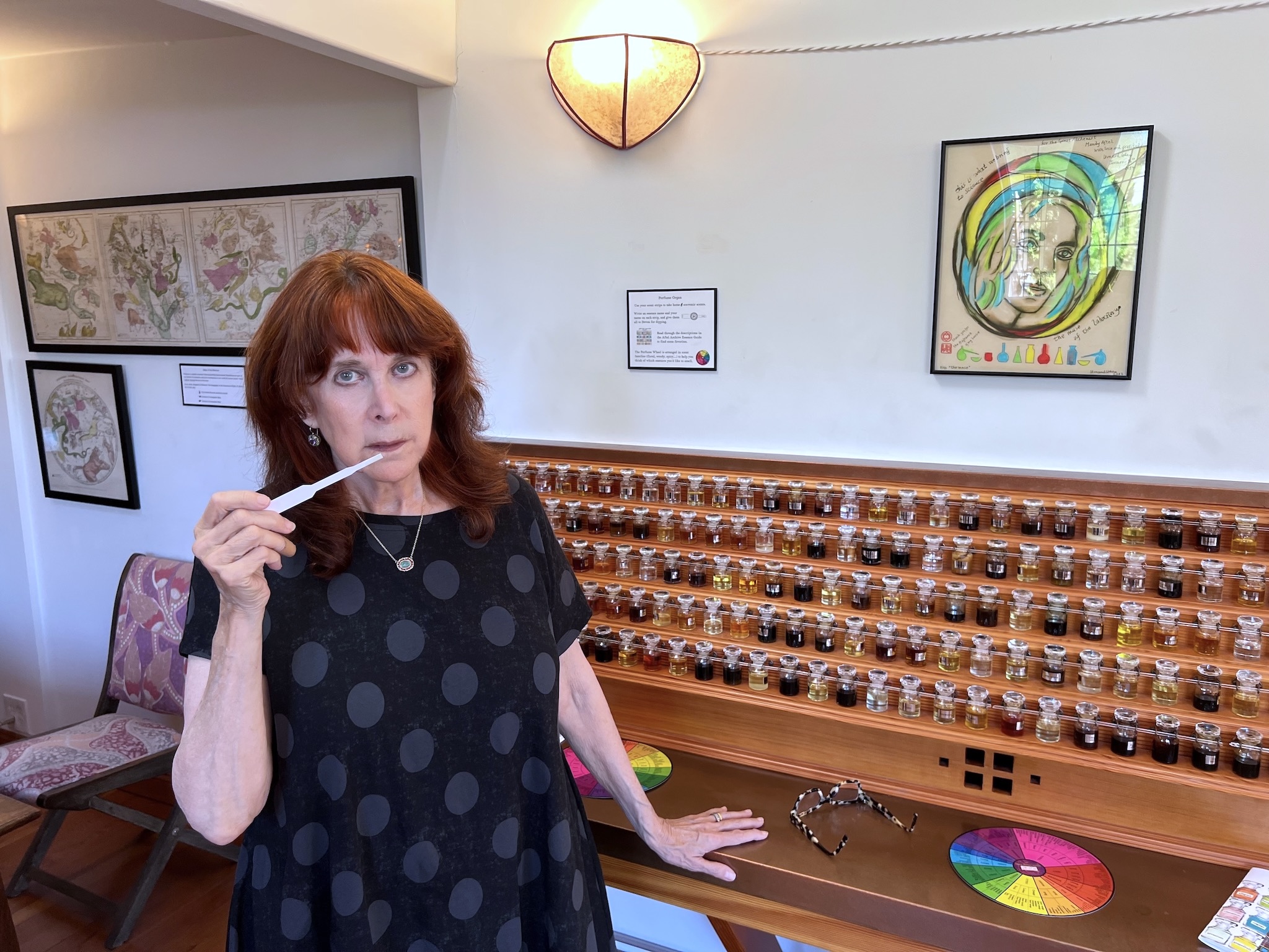 Mandy Aftel takes a whiff at her Aftel Archive of Curious Scents. (Foster Curry)