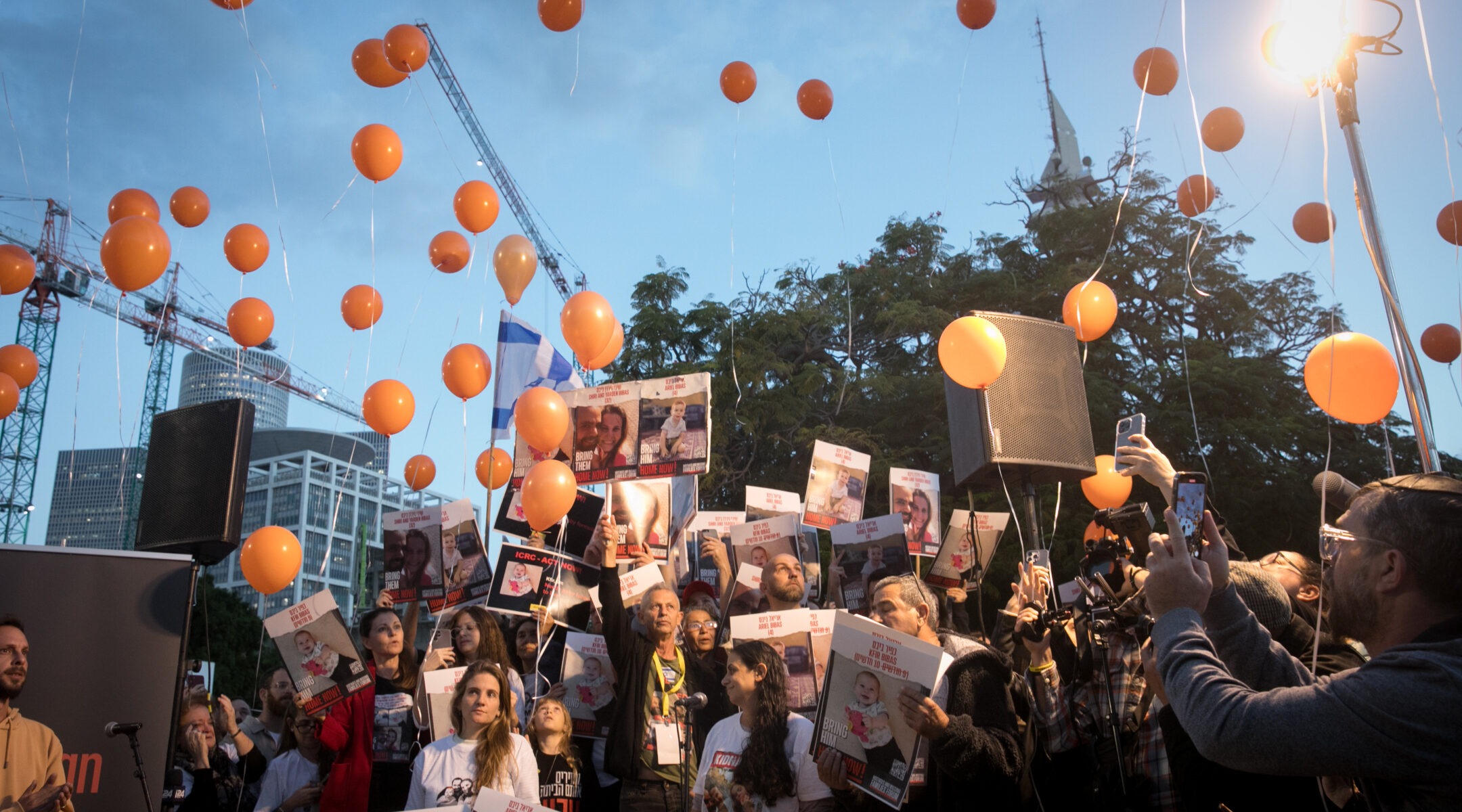 Orange balloons have become a symbol of the Bibas family because of the abducted children's red hair. (Miriam Alster/Flash90)