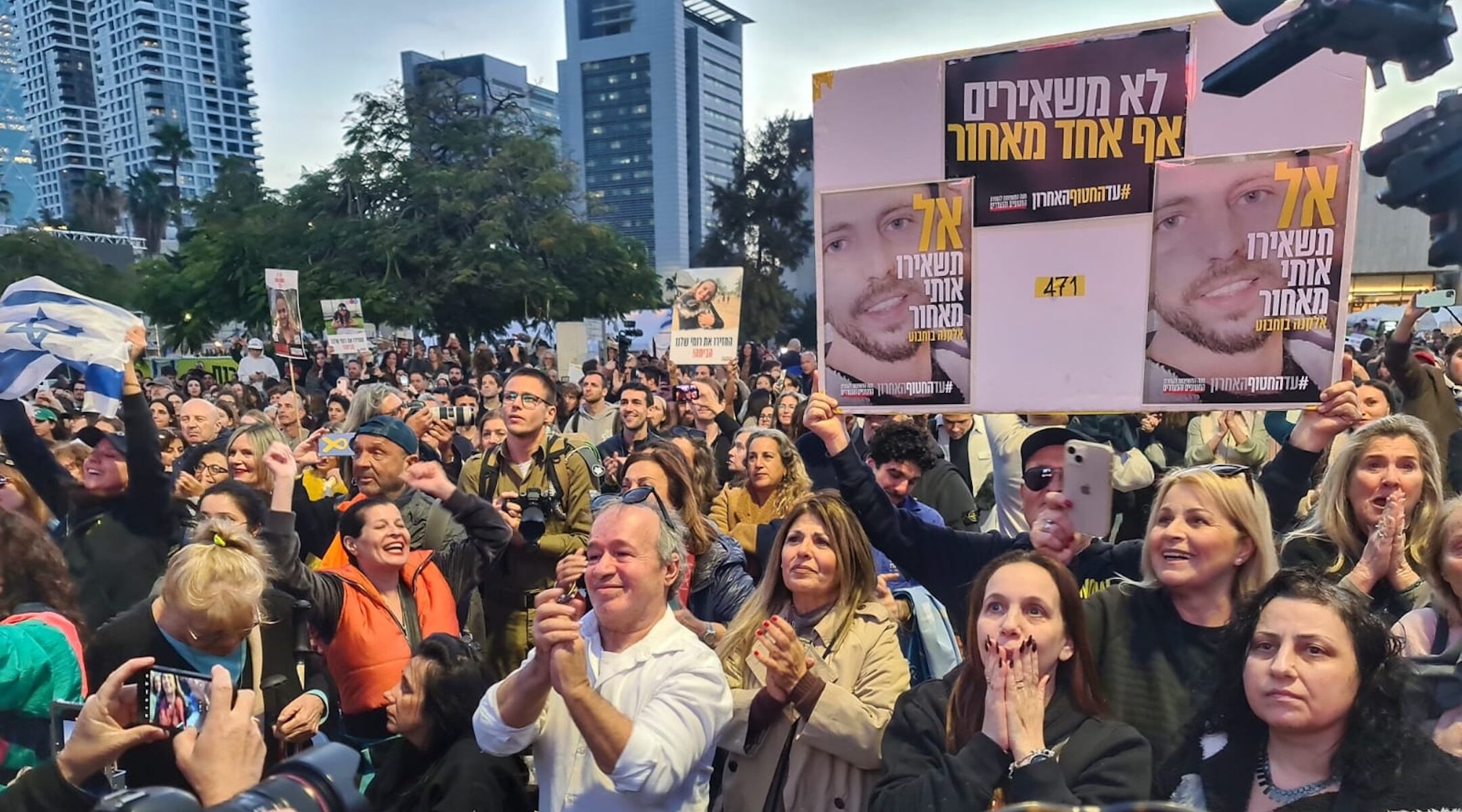 People gathered in what's known as Hostages Square react to news that three Israeli hostages have been released after a ceasefire agreement began between Israel and Hamas, Jan. 19, 2025. (Deborah Danan)