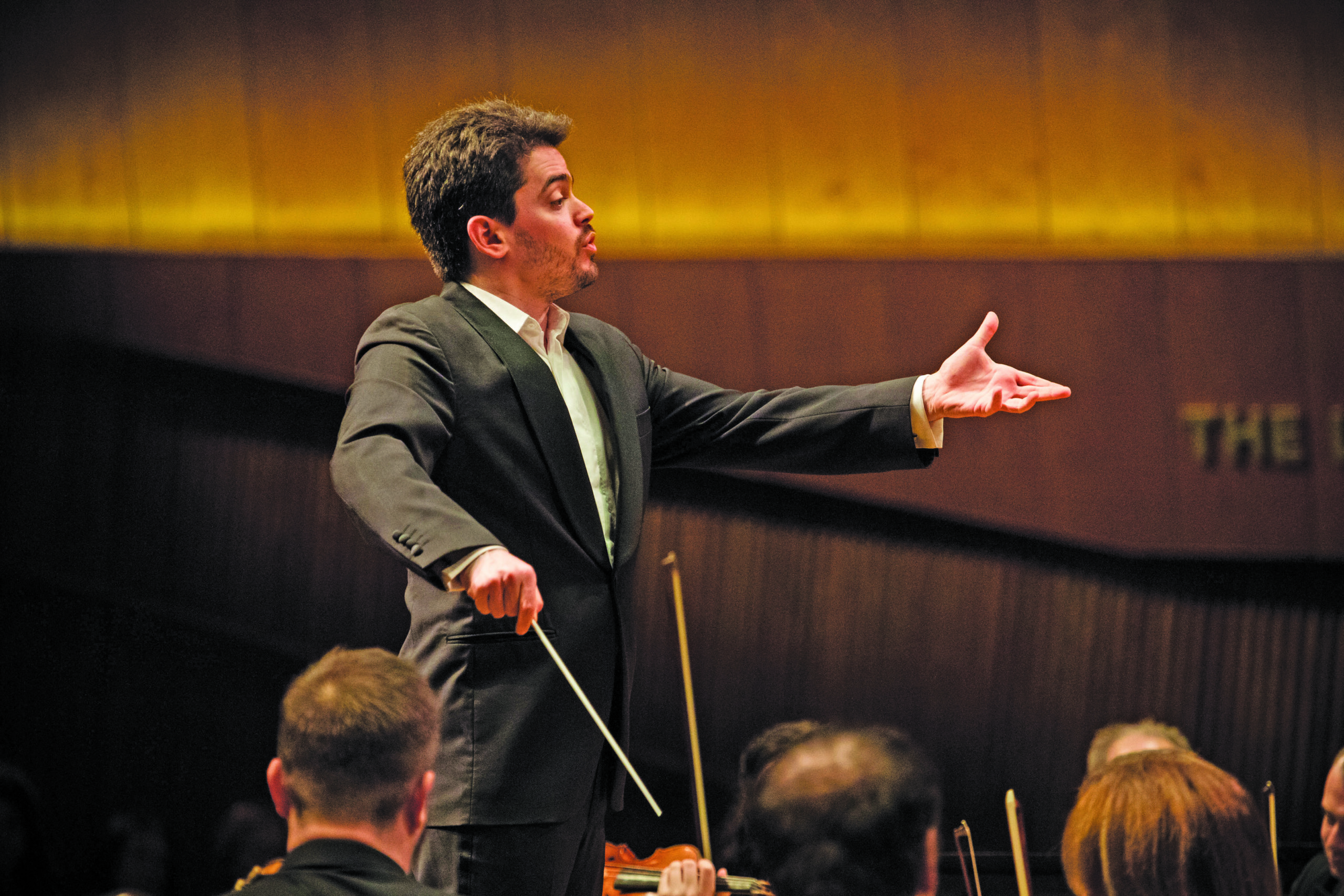 Music Director Lahav Shani conducts the Israel Philharmonic Orchestra. (Shai Skiff)