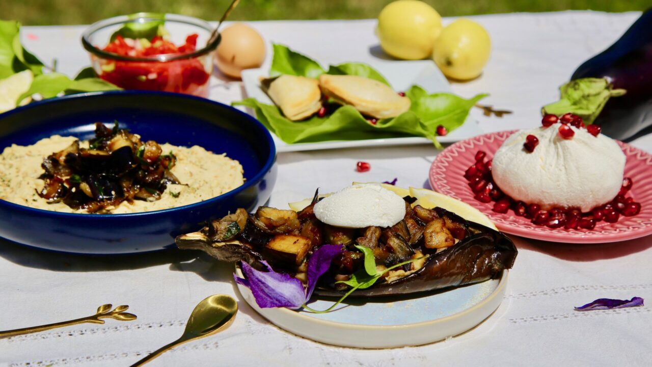 Hélène Jawhara Piñer's recipes include (from left) hummus with caramelized eggplant, stuffed eggplant with honey and labneh, and labneh with pomegranate seeds. (Courtesy)