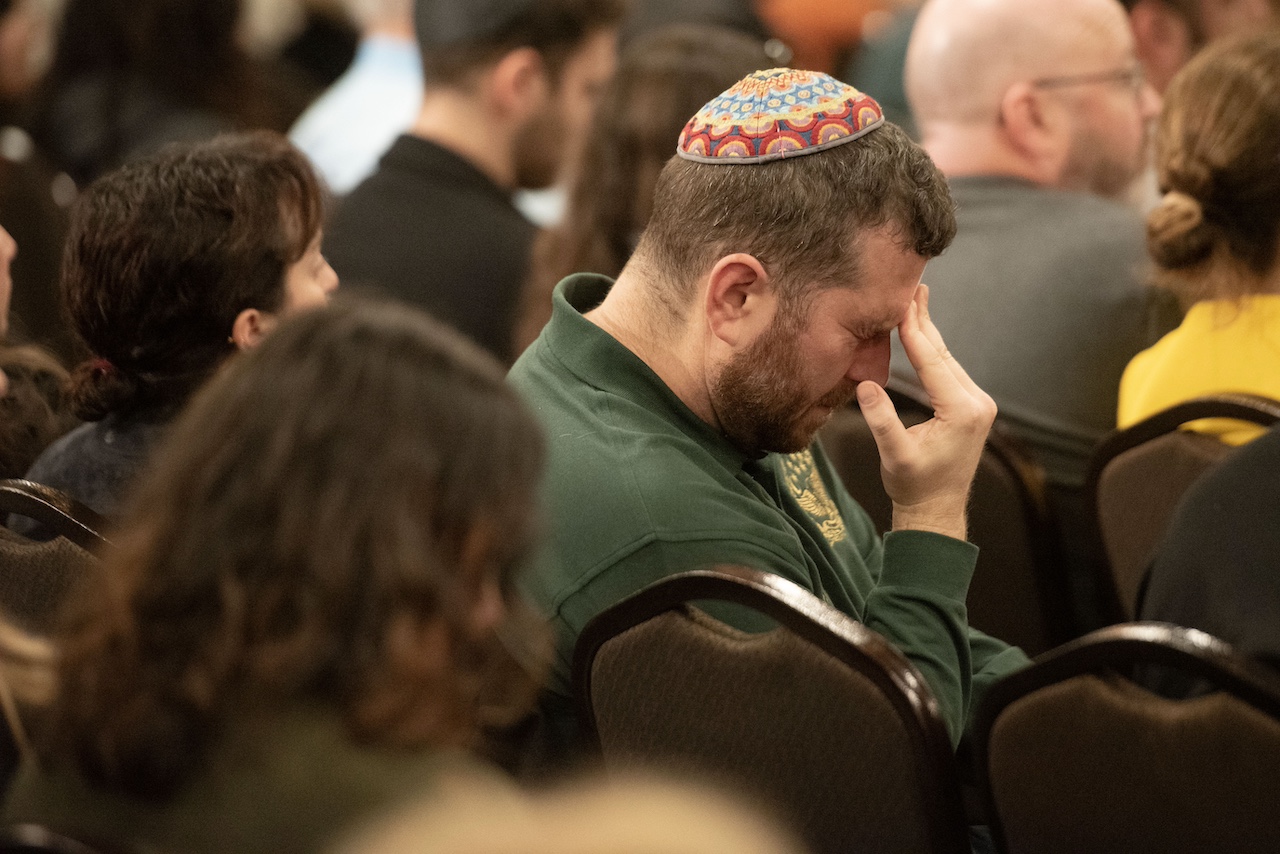 Matthew Finkelstein grieves during a Feb. 23 memorial service held in San Francisco for the Bibas family members and Oded Lifshitz. (Aaron Levy-Wolins/J. Staff)