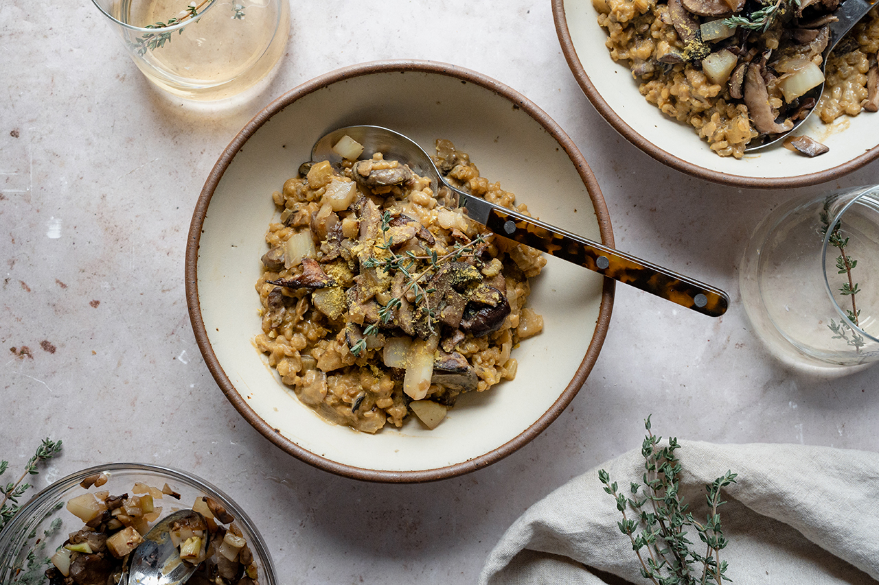 A plate of risotto on a table