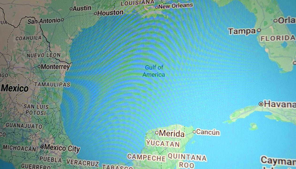 A photo of a laptop screen displaying the Gulf of Mexico on Google Maps