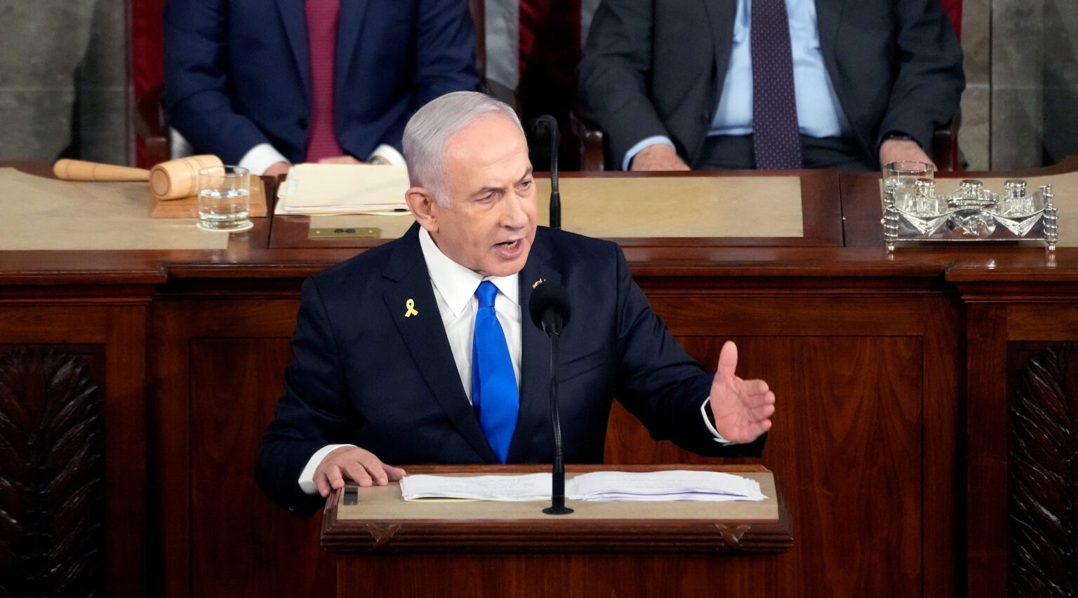 Netanyahu speaks at a lectern