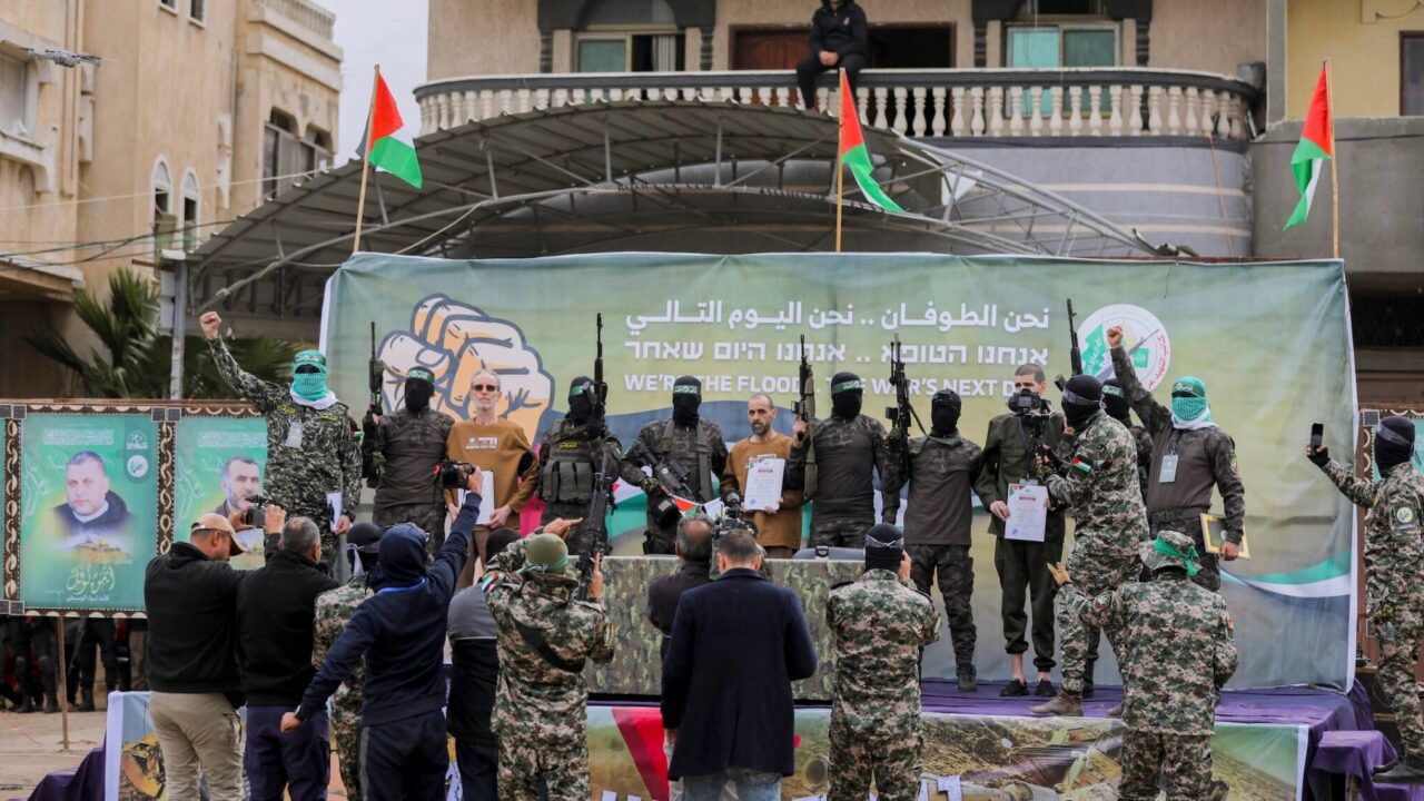hostages on a stage in Gaza