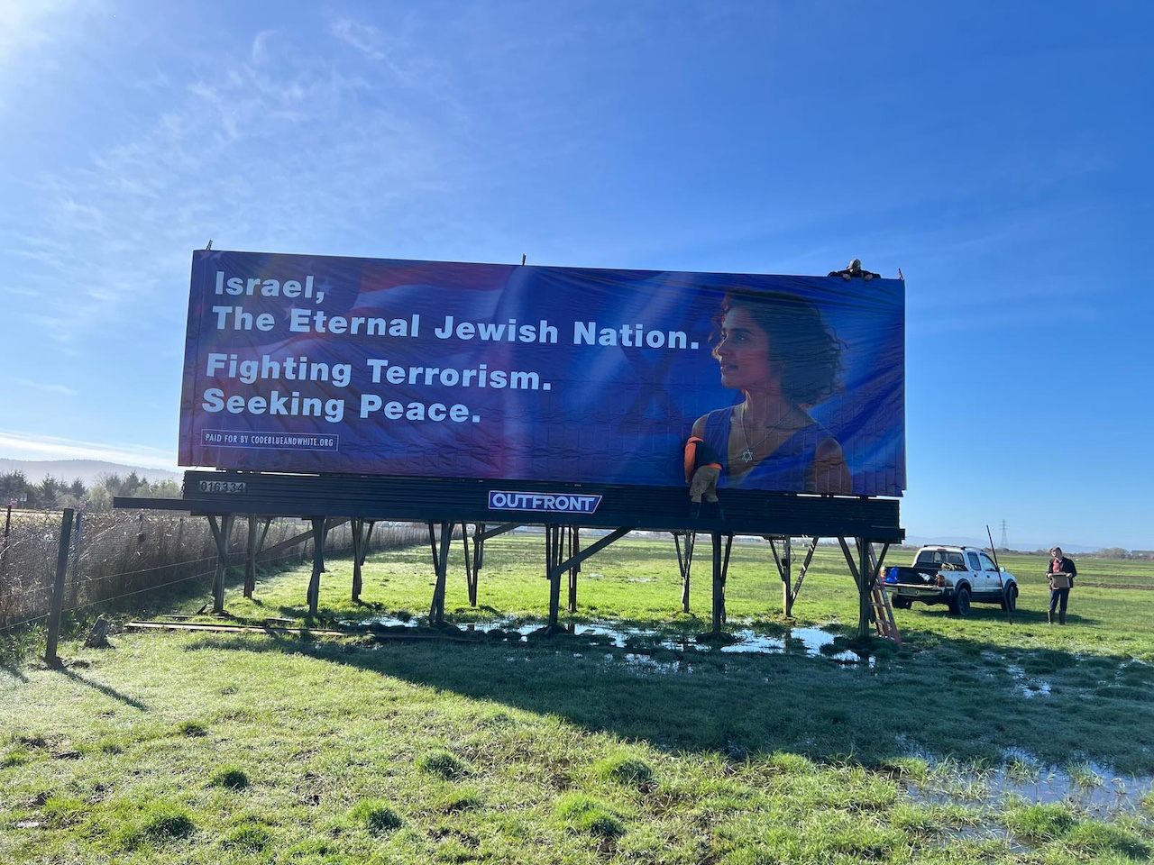 A new billboard by Code Blue and White was put up by the highway in Arcata, replacing one that was torn down. (Courtesy)