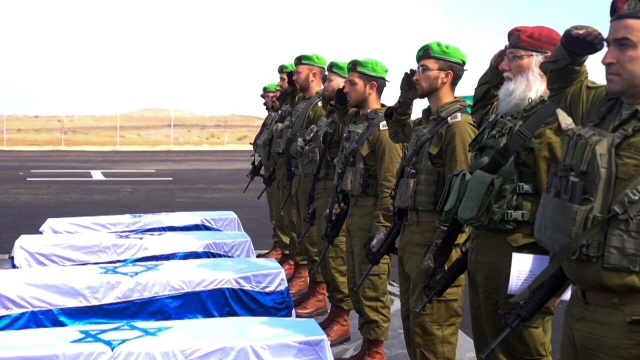 The Israel Defense Forces received the caskets and draped them in Israeli flags on Thursday. (Israel Government Press Office)