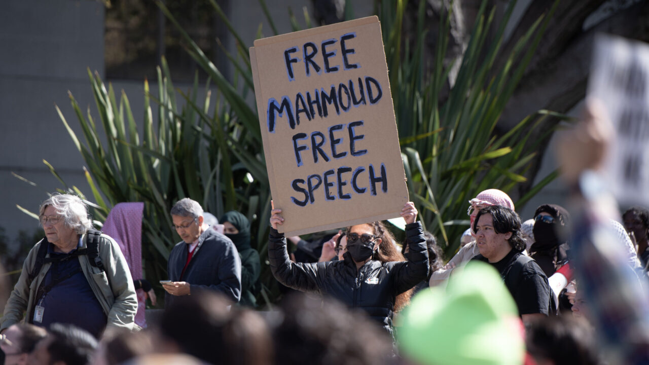 A demonstrator holds a sign calling for the release of Mahmoud Khalil during a protest against the arrest of the Columbia University pro-Palestinian activist at UC Berkeley, March 11, 2025. (Aaron Levy-Wolins/J. Staff)