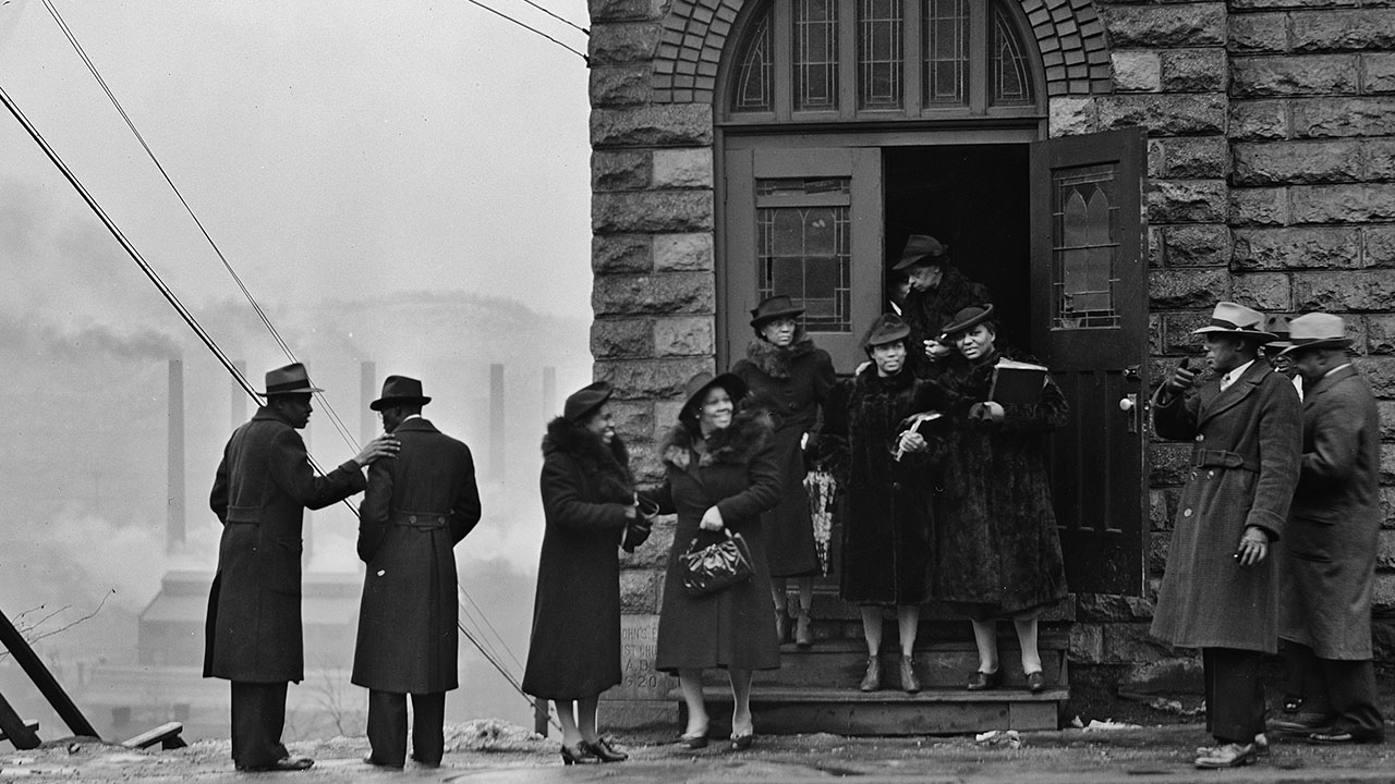 The congregation exits a Black church in Pittsburgh in 1941. (Jack Delano/Farm Security Administration)