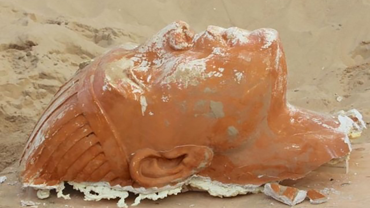 A 300-pound plaster sphinx head from Cecil B. DeMille's 1923 film "The Then Commandments," which was buried along with the rest of the set under the sand at Guadalupe-Nipomo Dunes for almost a century. (Courtesy Dunes Center)