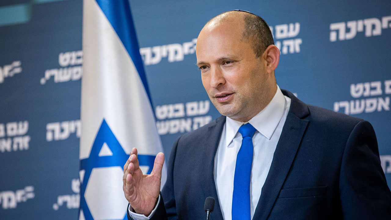 Prime Minister Naftali Bennett speaks at a news conference at the Knesset in Jerusalem, April 21, 2021. (Yonatan Sindel/Flash90)