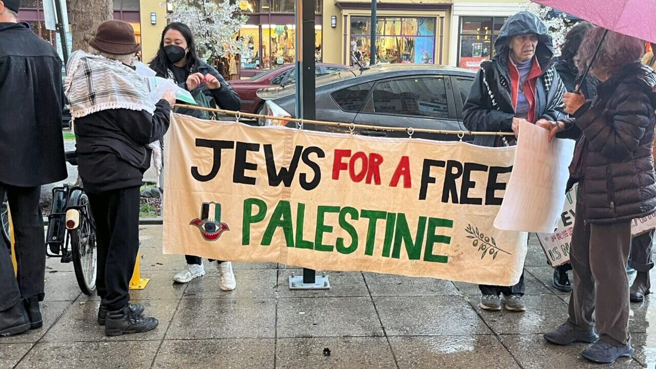 Protesters gathered outside a Santa Cruz theater on April 1 to demonstrate against a documentary detailing antisemitism. (Niva Ashkenazi/J. Staff)