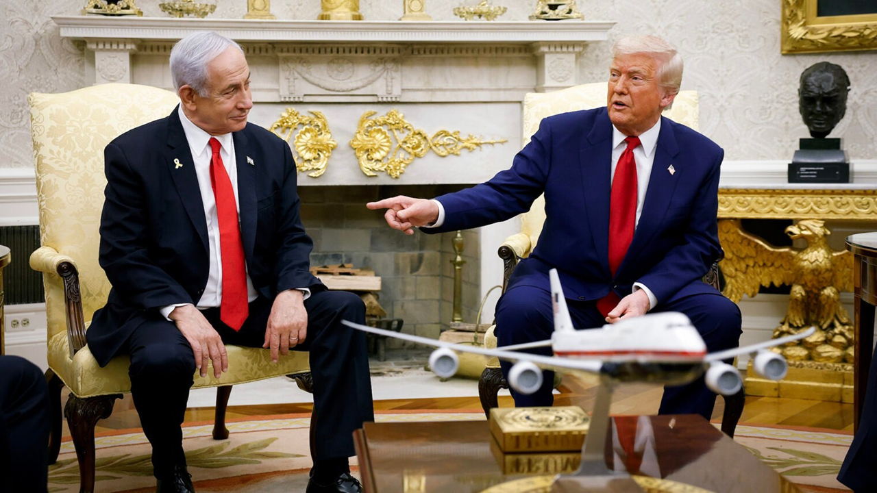 Both men are seated in the Oval Office. Trump gestures at Netanyahu as he speaks.