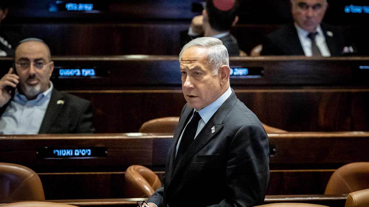 Israeli Prime Minister Benjamin Netanyahu seen during a discussion and a vote in the assembly hall of the Knesset, the Israeli parliament in Jerusalem, March 22, 2023. (Yonatan Sindel/Flash90)