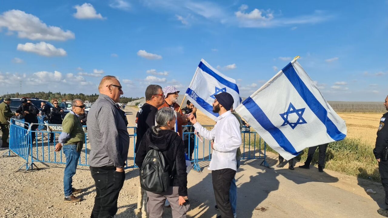 People standing with Israeli flags