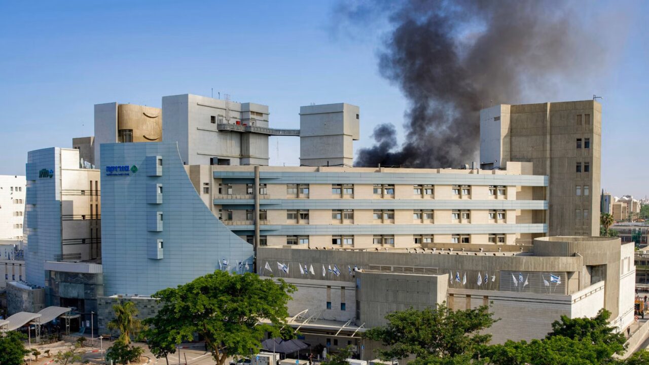 Smoke billows from a building at Soroka Hospital in Beersheba in southern Israel following an Iranian missile attack on June 19, 2025. (Maya Levin/AFP via Getty Images)