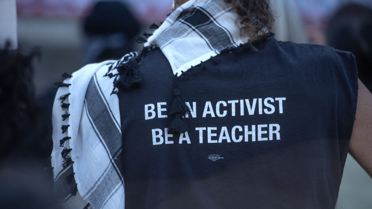 Shirt says Be an Activist Be a Teacher