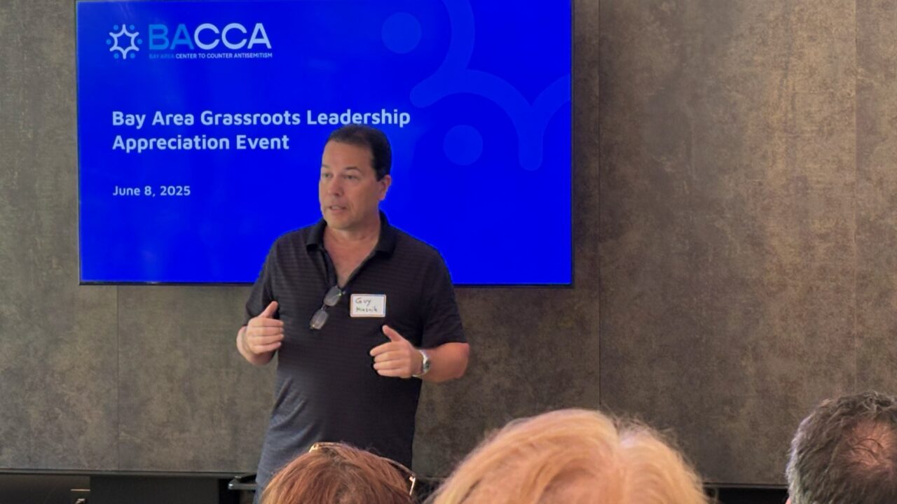 Man speaks to a group