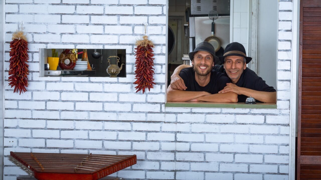Eitan Hilleli (right) with his son Joseph at Sabra Grill. (Courtesy)