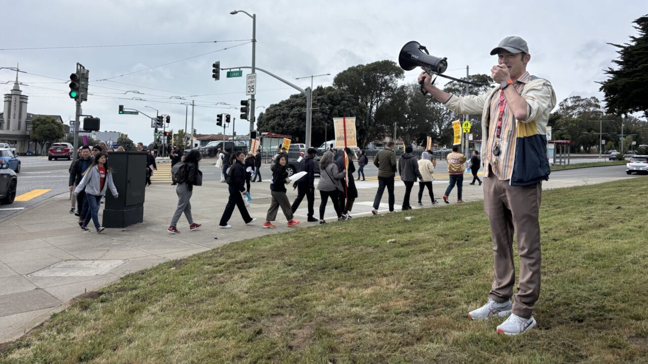 man protests union rally