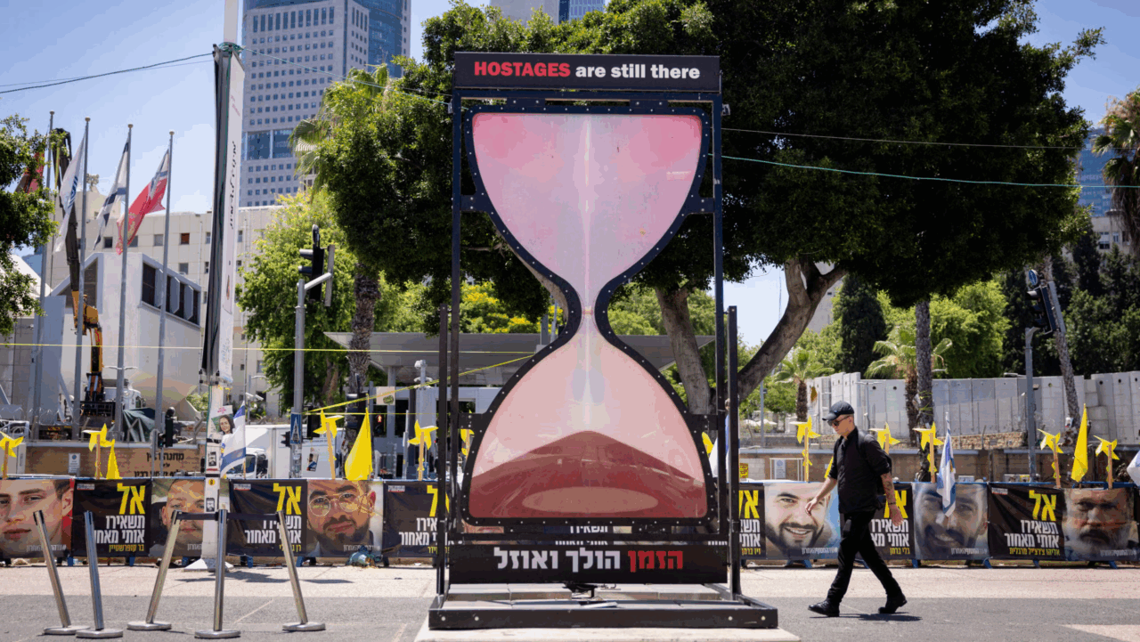 A sign calling attention to the hostages' plight in Tel Aviv