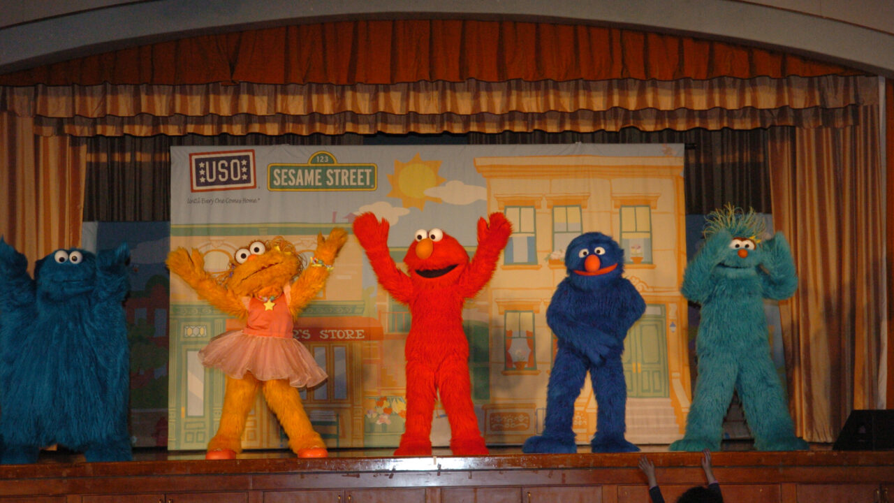 Sesame Street characters performing