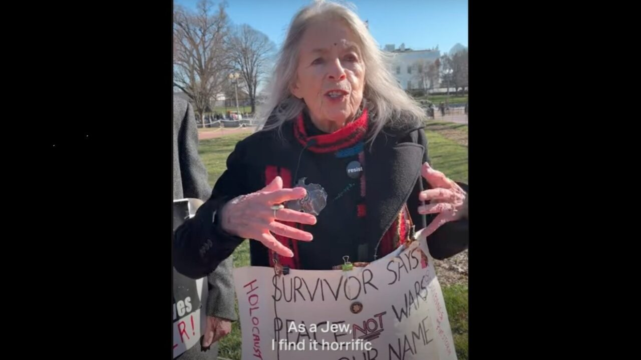 woman in front of White House