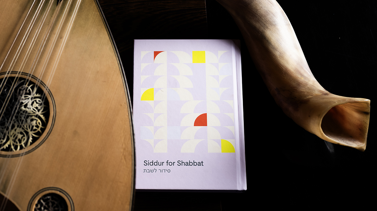 prayerbook, shofar and stringed instrument