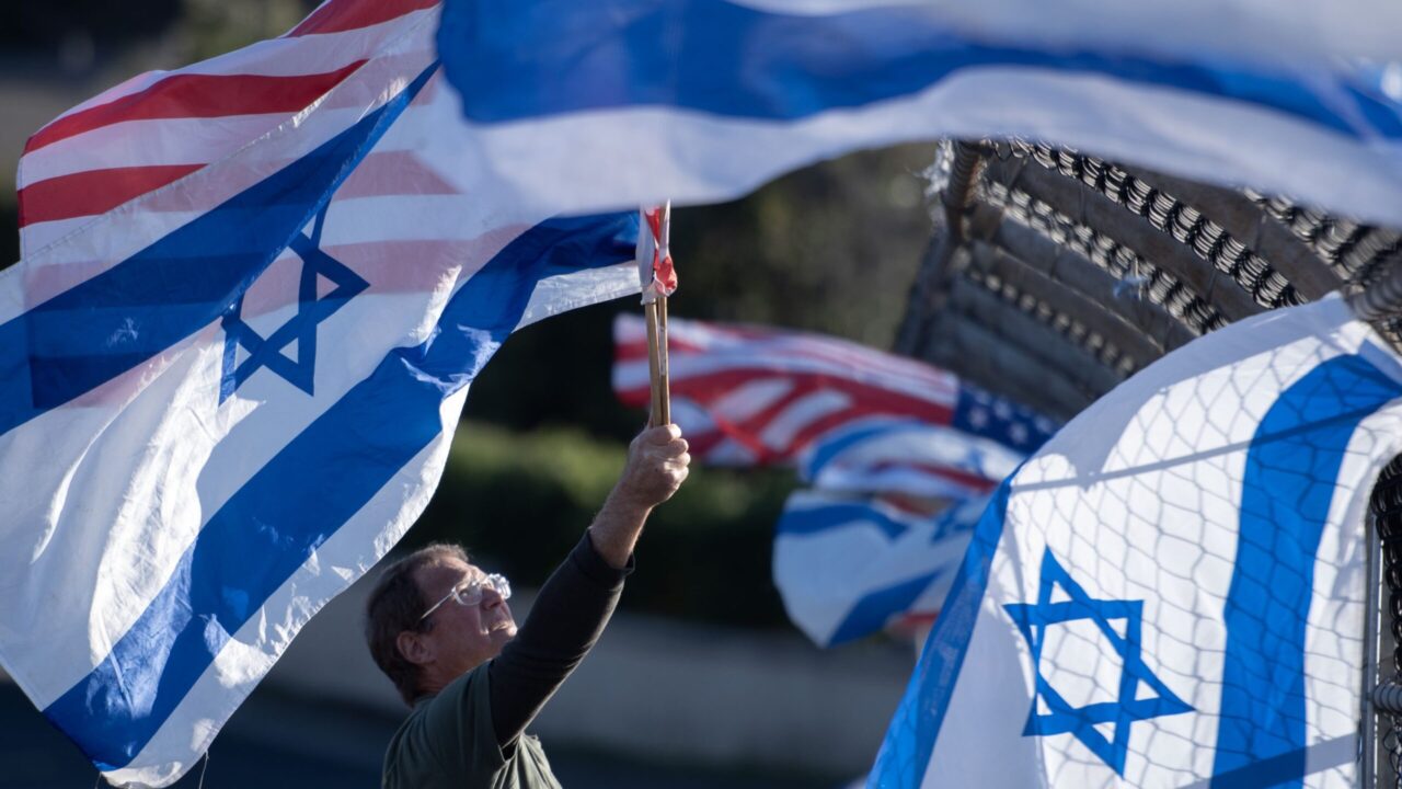 Israeli and US flags in the wind
