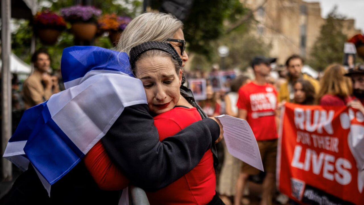 two people embrace