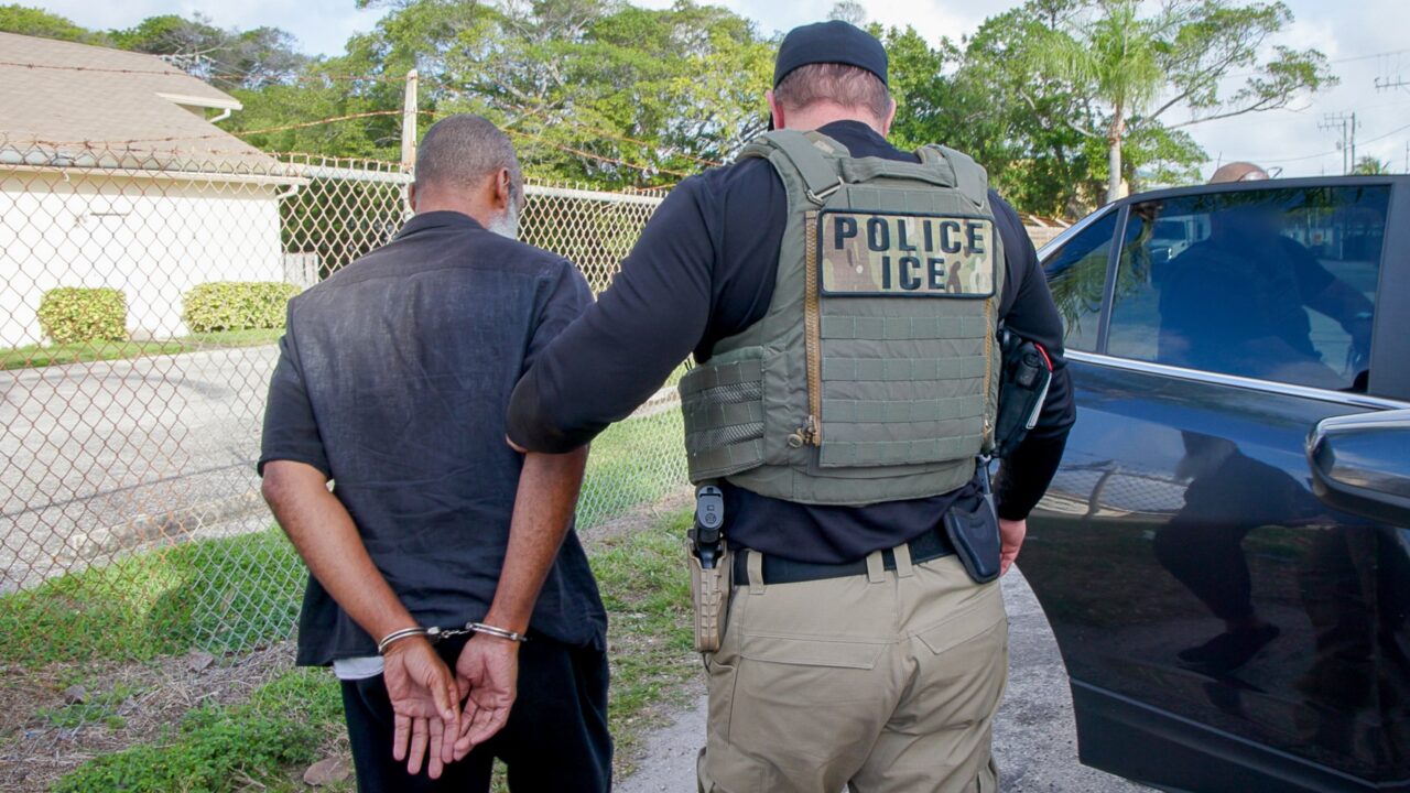 ICE officer arrests man
