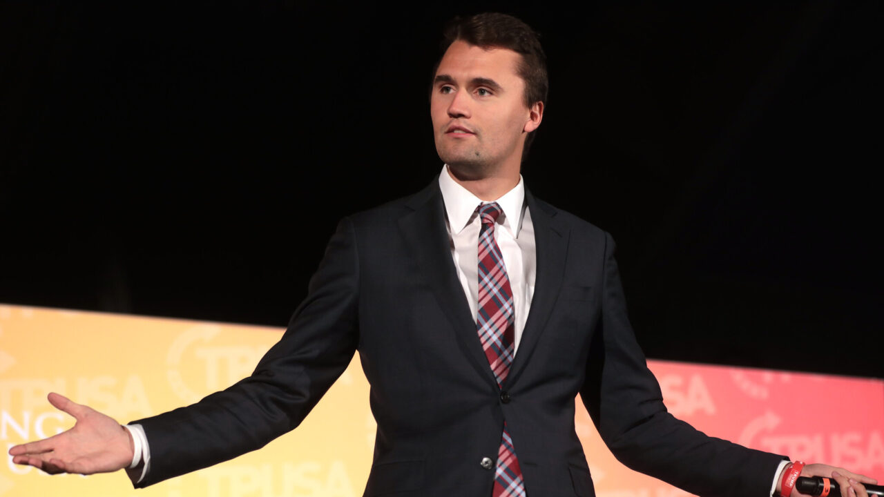 Charlie Kirk speaks onstage