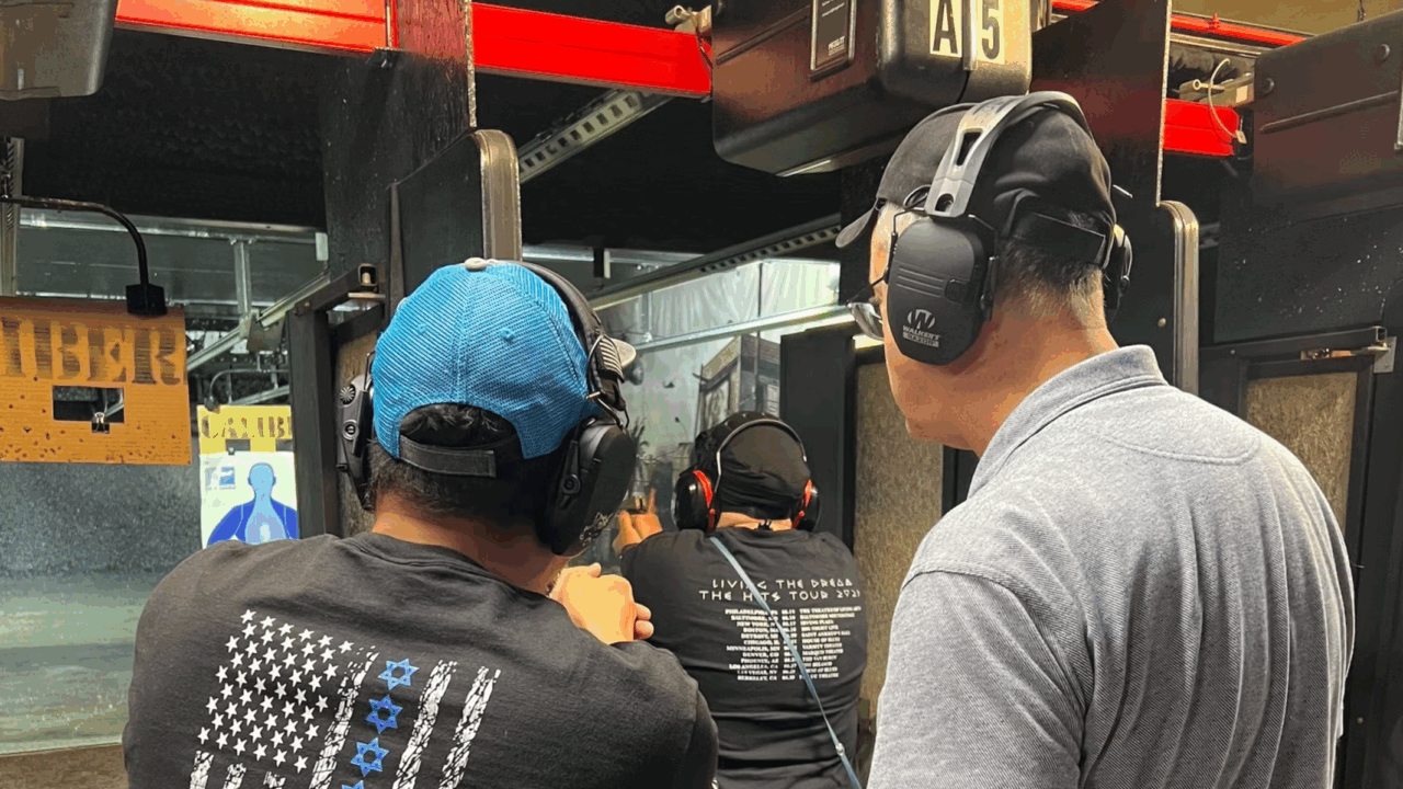 Jewish adults learning to shoot guns