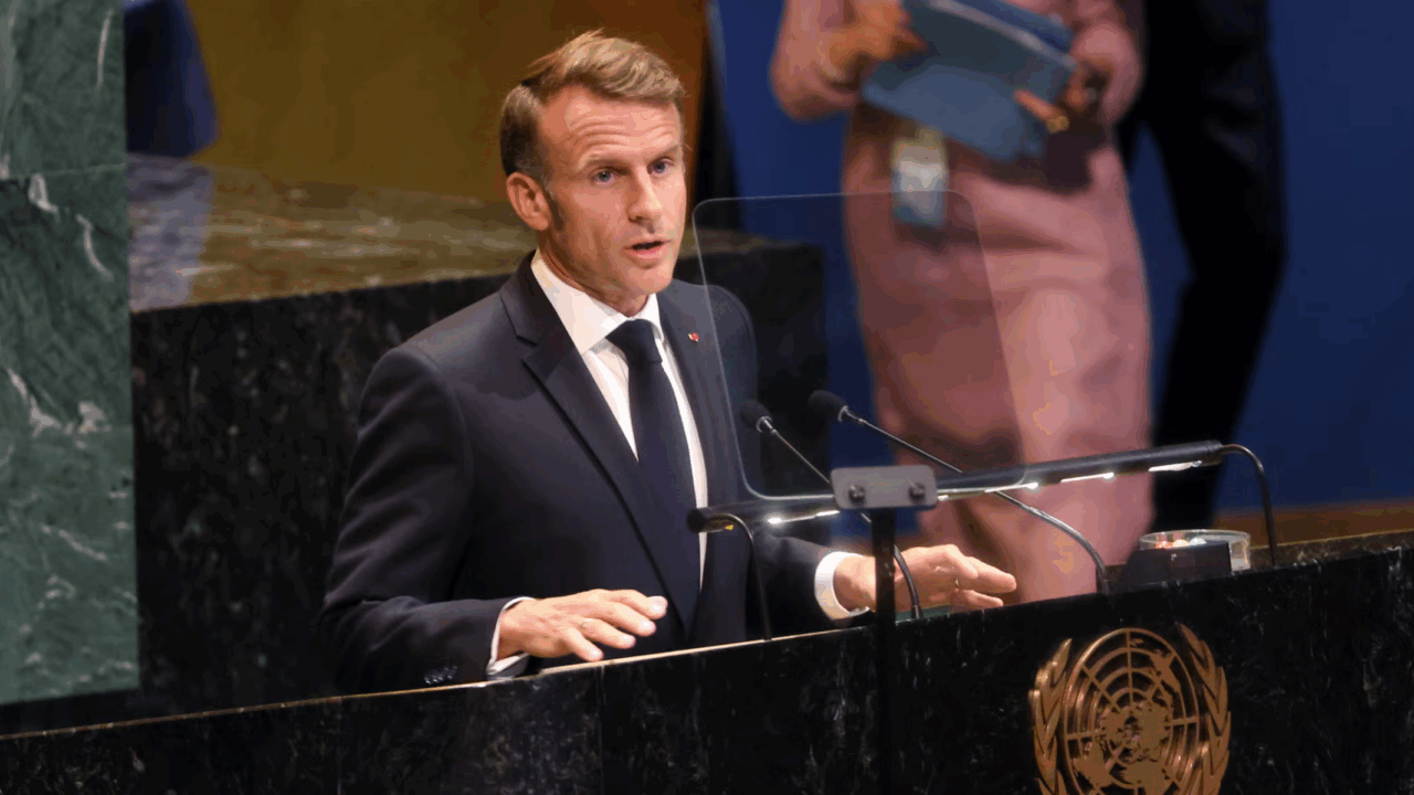 Emmanuel Macron speaks onstage