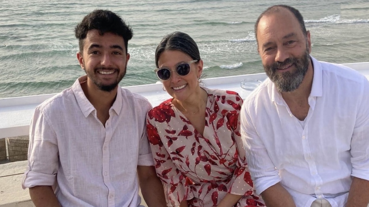 parents and son smiling