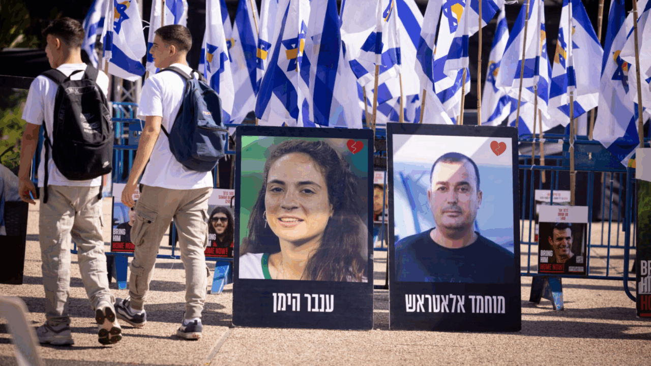 Posters of deceased hostages Inbar Hayman and Muhammad Al-Atarash