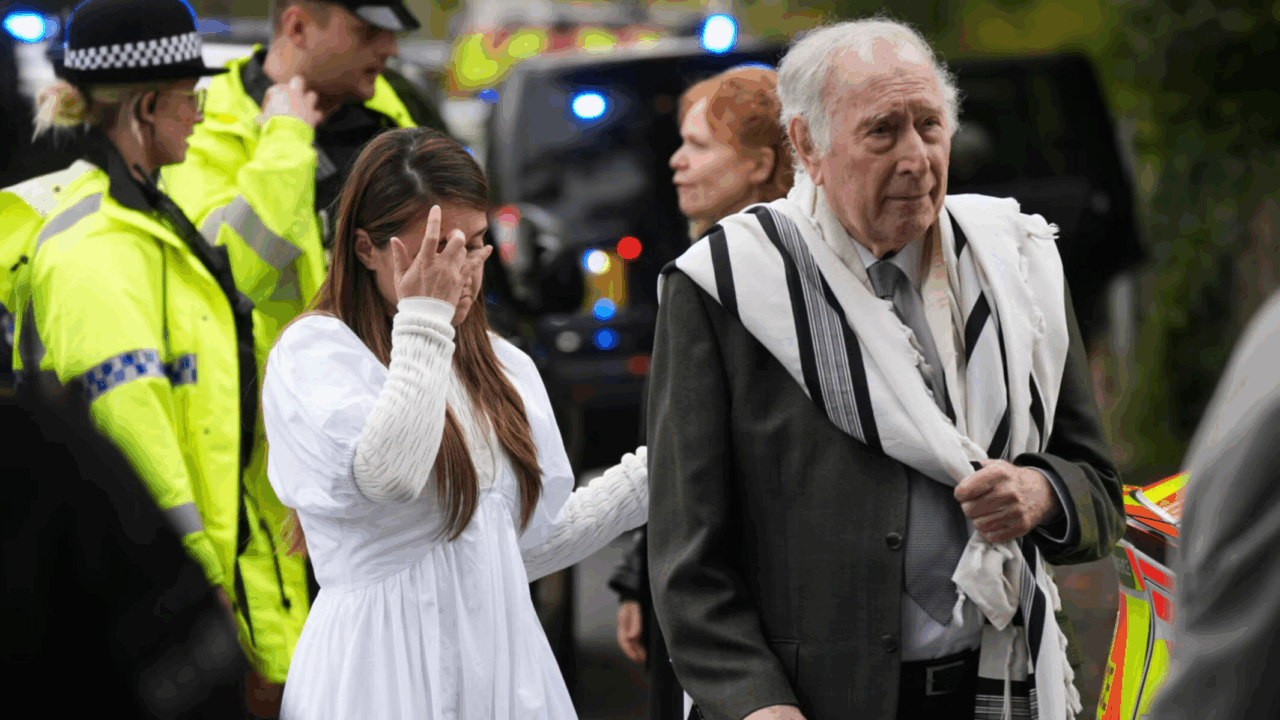 Congregants and police after the shooting in Manchester