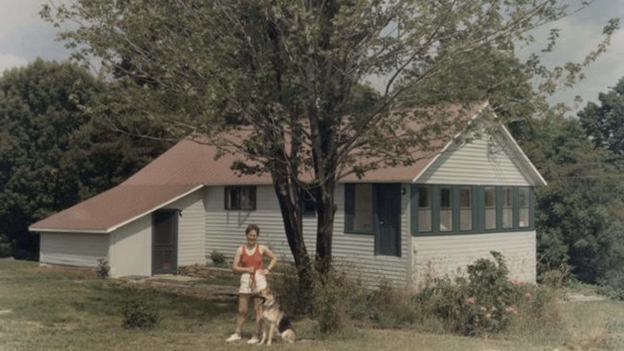 Nancy Gonchar at 32 with her dog Emma, named for the anarchist revolutionary Emma Goldman, on a 40 acre farm that she owned with a partner in upstate New York. (Courtesy)