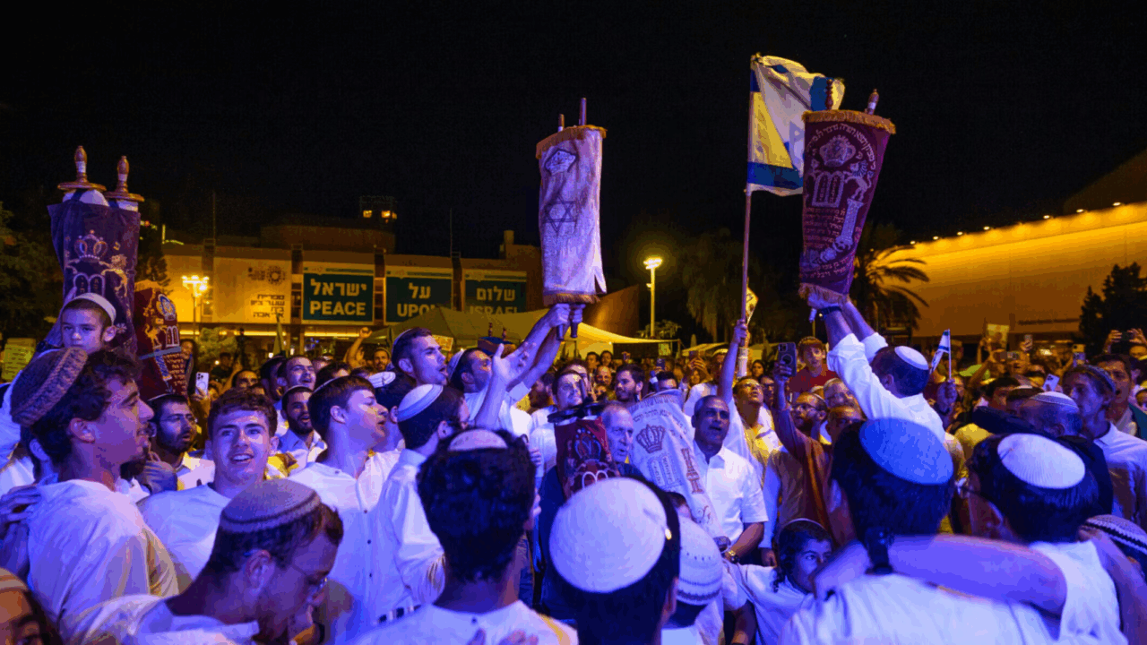 People dance at Hostages Square