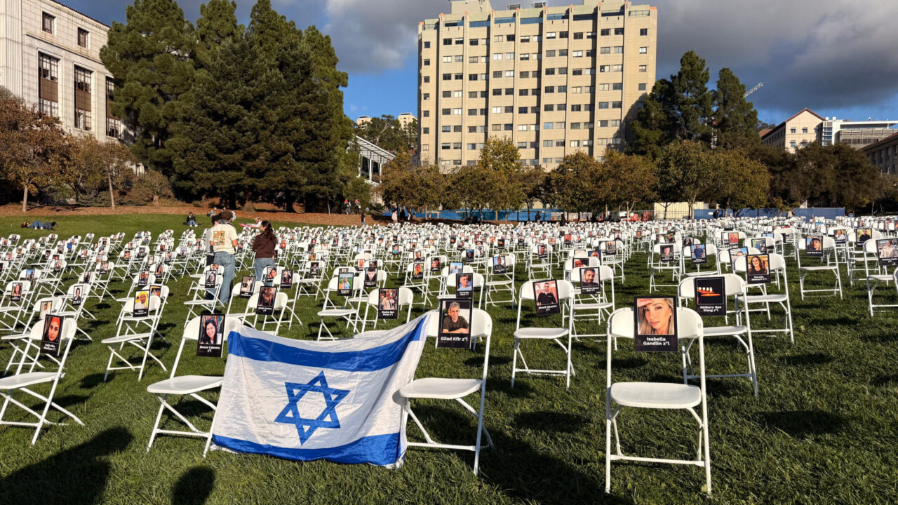 Each of around 1,200 folding chairs on UC Berkeley's Memorial Glade on Nov. 18 holds a photo of a person killed in the Oct. 7, 2023, Hamas massacre or during captivity in Gaza. (Niva Ashkenazi/J. Staff)