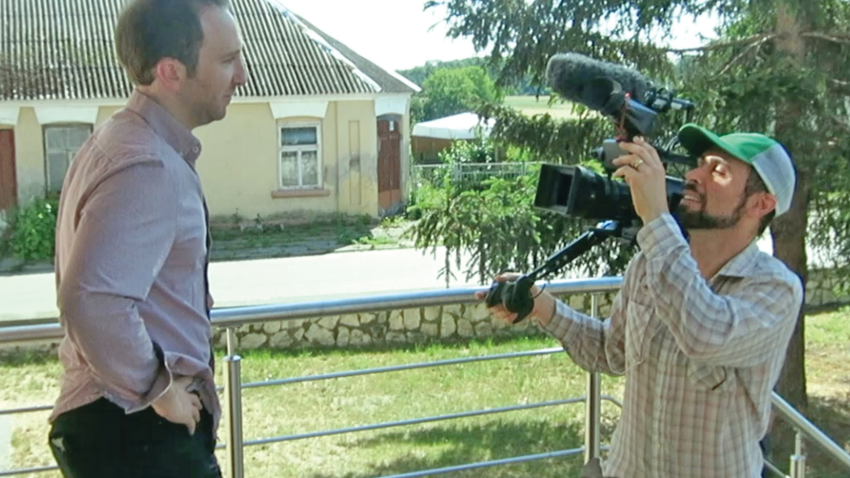 Yoav Potash films Aaron Tartakovsky outside Gniewoszów City Hall in June 2017 for the film "Among Neighbors." (Sue Barnett/J. Staff)