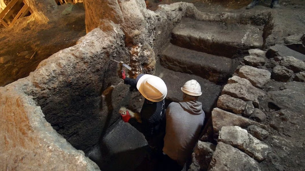 Workers clear debris
