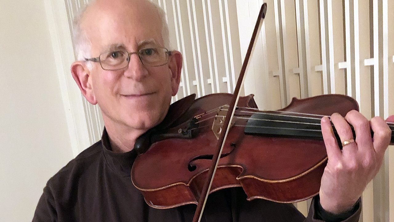Dr. Jerry Saliman says that playing music for a hospice patient seemed like the right way for him to express his care. (Courtesy)
