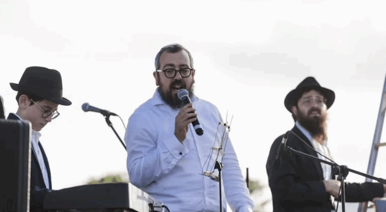 Rabbi Eli Schlanger (center) was a Chabad emissary who was killed in Sunday's attack on Bondi Beach. (Courtesy Chabad)