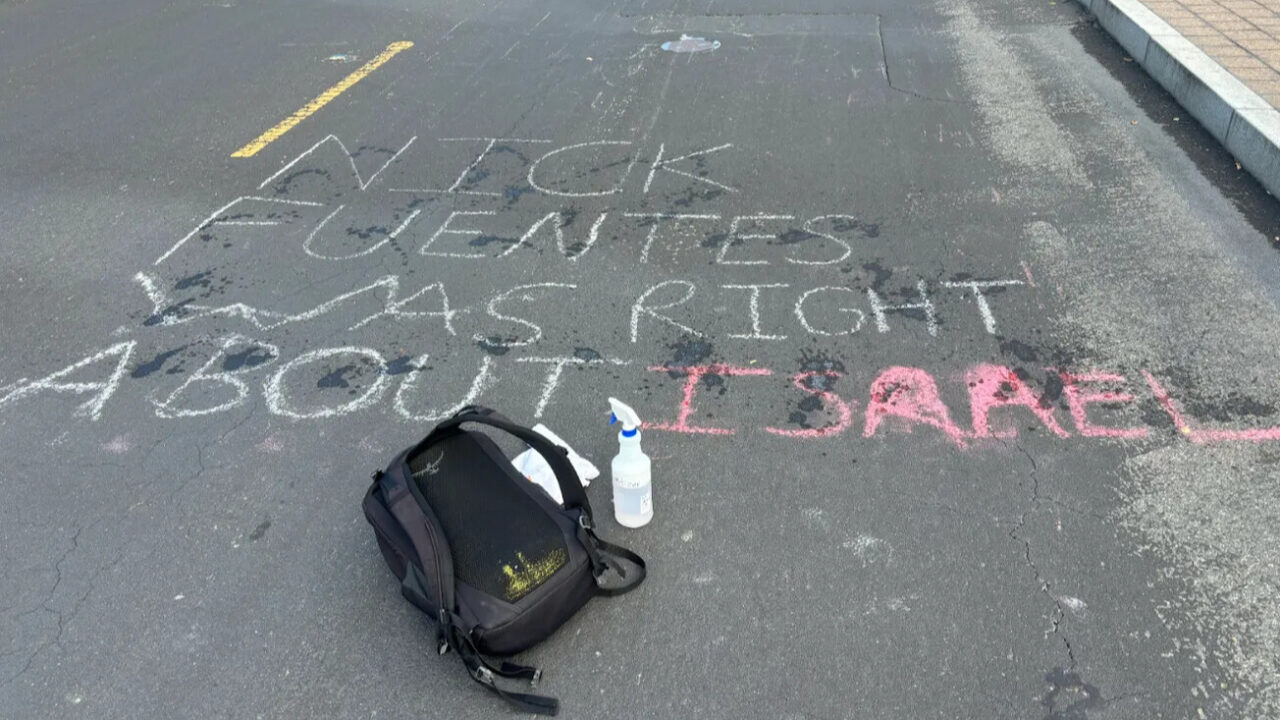 "Nick Fuentes was right about Israel," a reference to the far right pundit, was found written in chalk in the middle of Jane Stanford way by a group of students on Nov. 14, 2025. (Courtesy Teddy Ganea/The Stanford Review)