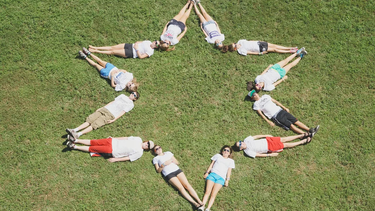 Jewish summer campers use their bodies to form a Star of David. (Courtesy Foundation for Jewish Camp)